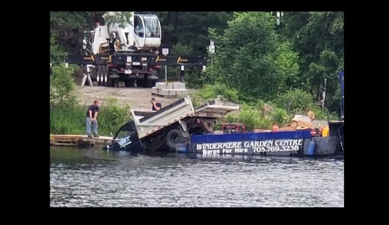 Ministry of Environment notified after truck falls off barge into Lake Muskoka