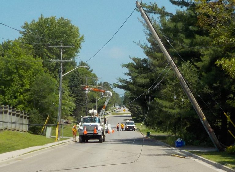 Power restored but road still closed following truck crash – UPDATED