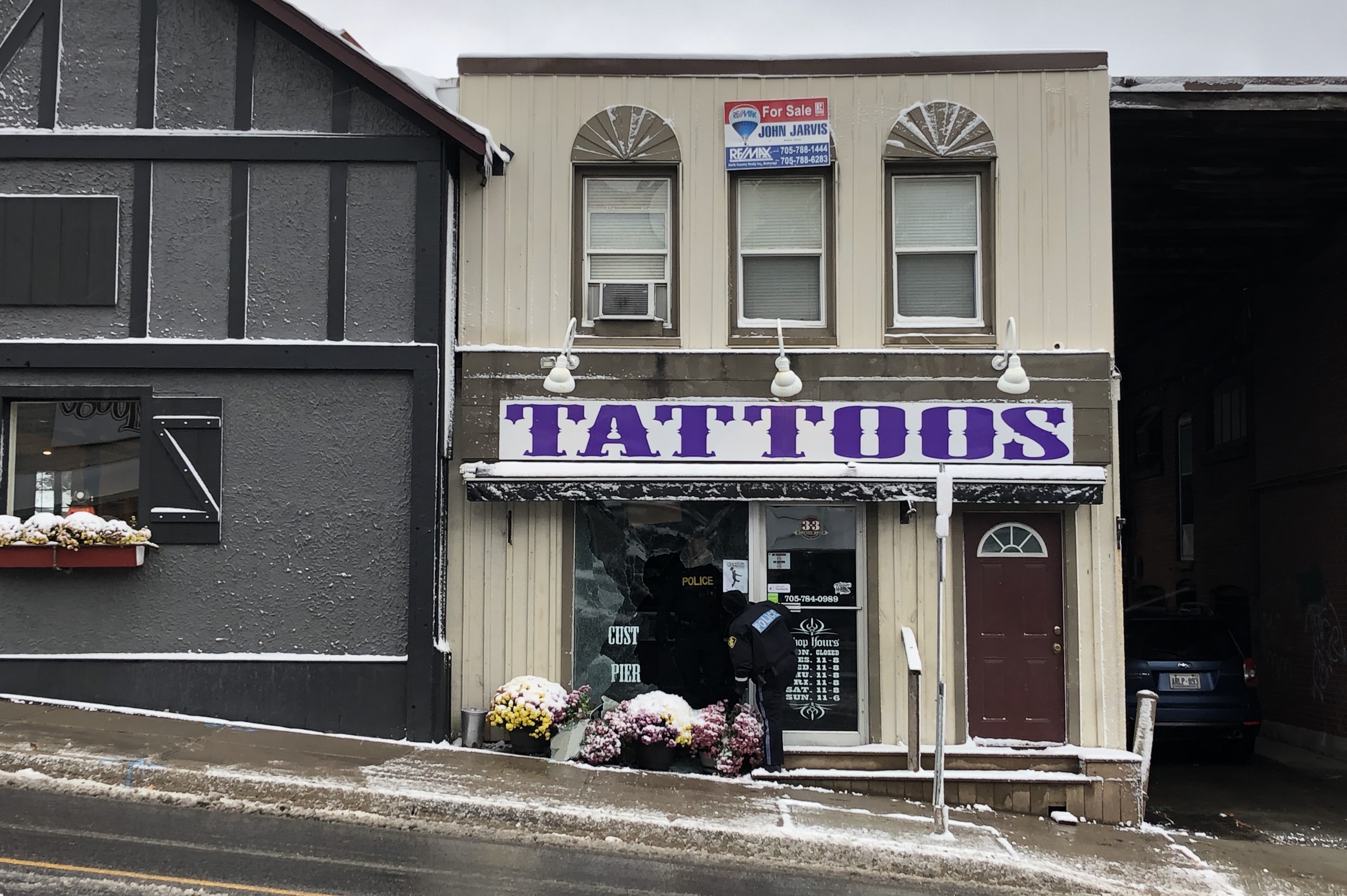 Tattoo shop window smashed in downtown Huntsville - My 