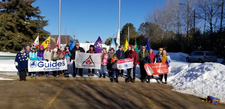 Flag raised to recognize Scout-Guide week