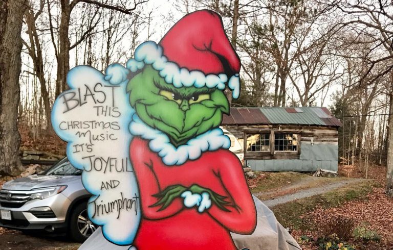 Local Artist Putting Christmas Lawn Pieces On Display